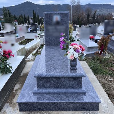 Granite grave with a wide headstone
