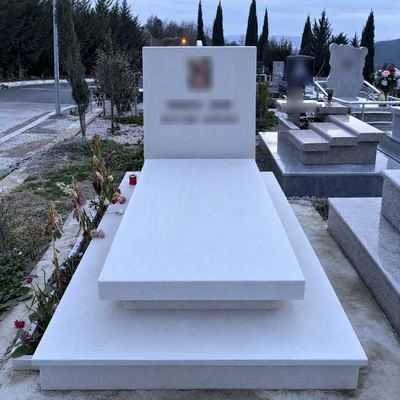 New white marble grave with headstone